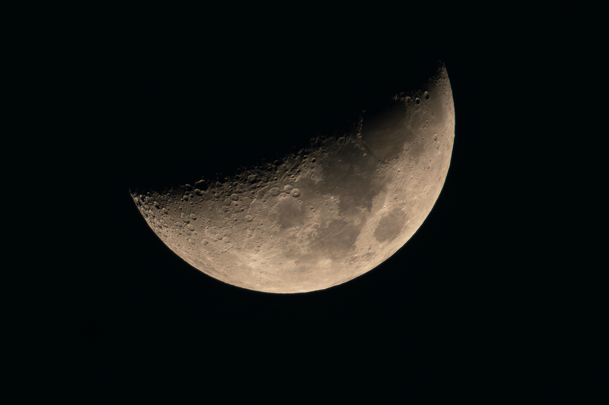 Waxing crescent moon, approaching half moon