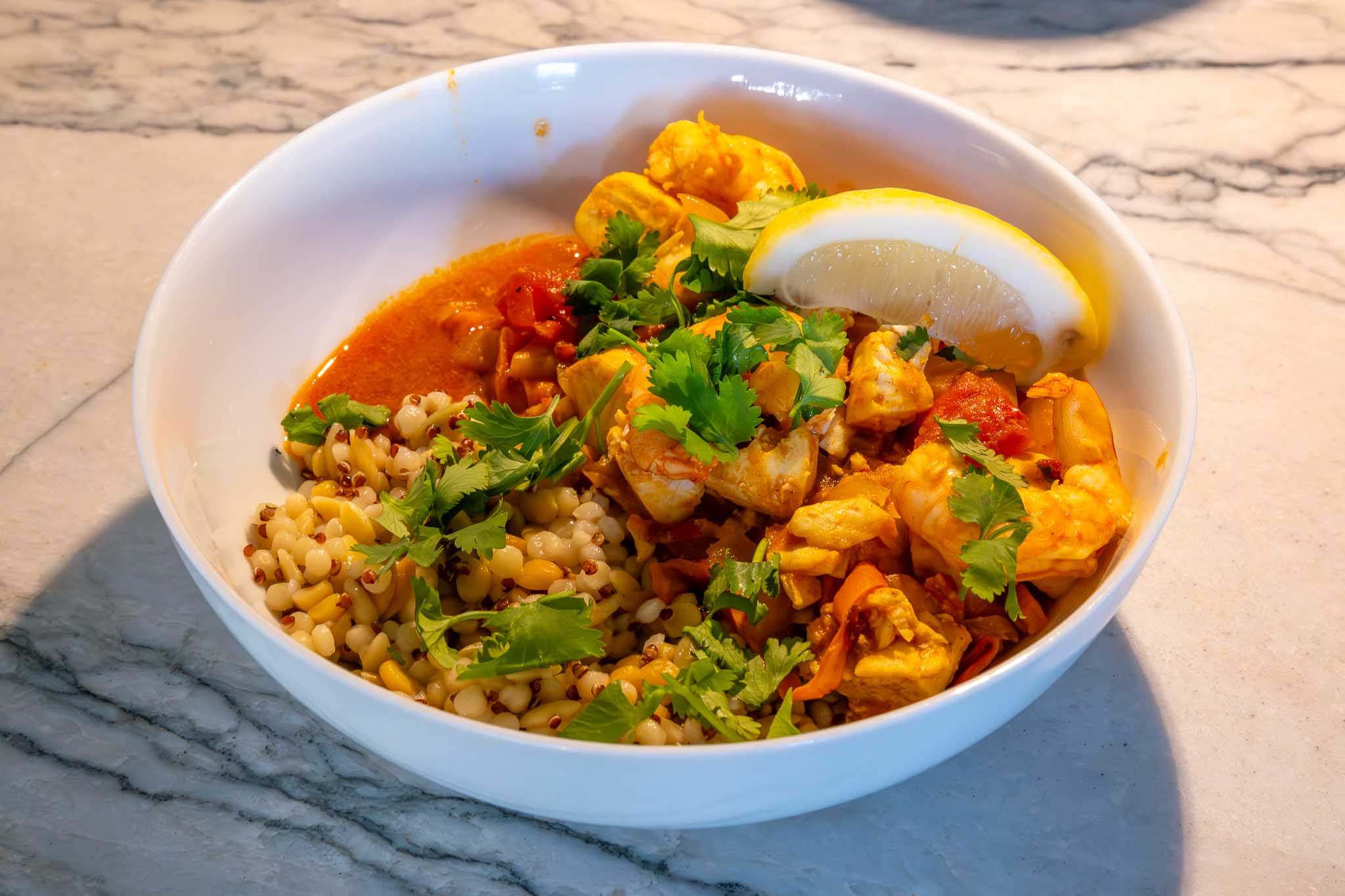 Cooking with Claude: Harissa spiced fish and shrimp tagine